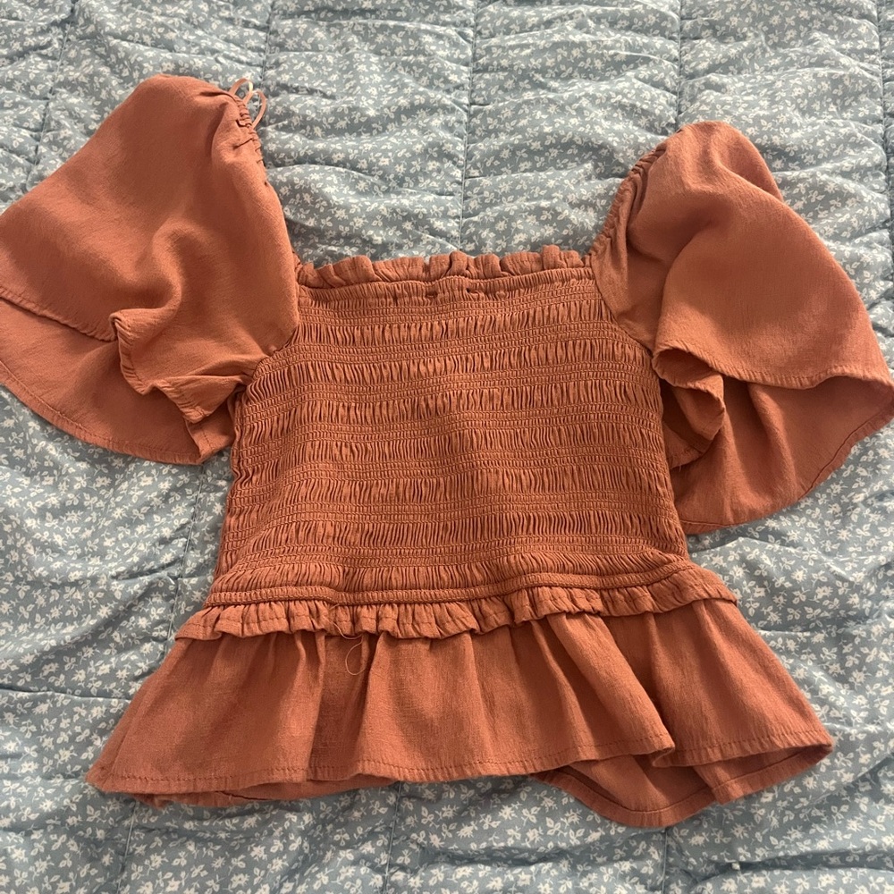 orange top so flattering !!